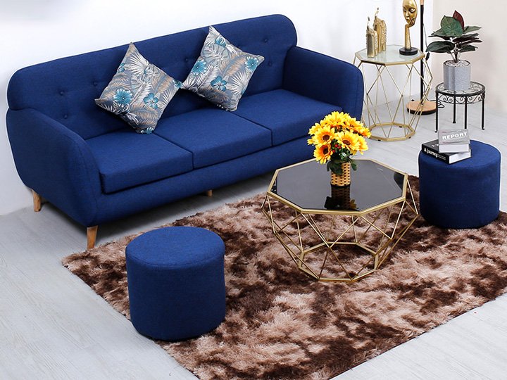 Ghế sofa màu xanh đậm mang đến điều mới mẻ gì cho phòng khách nhà bạn?